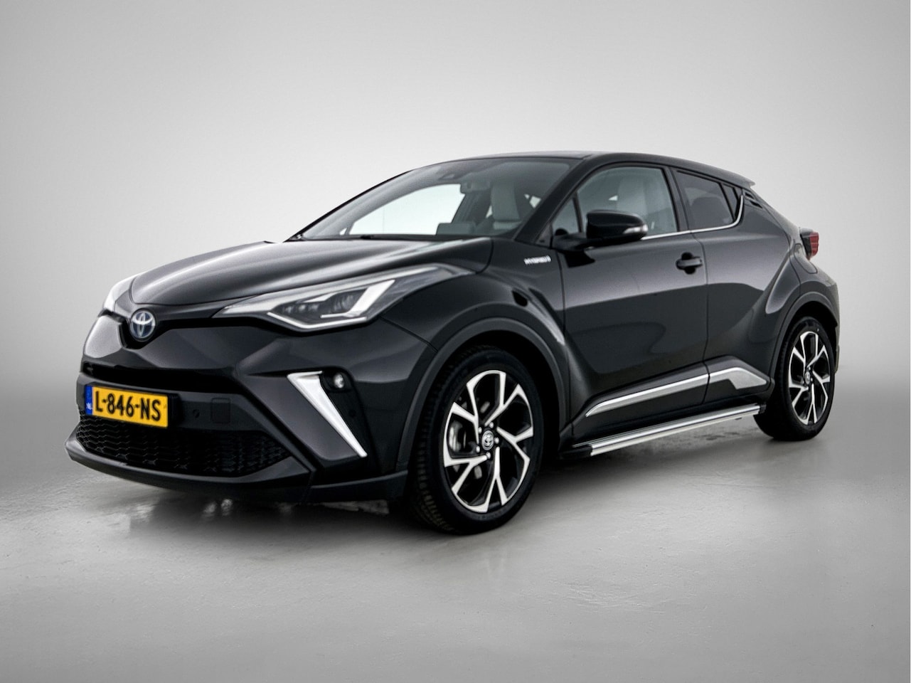 Toyota C-HR - 2.0 Hybrid Style | Lederen bekleding | Treeplanken | - AutoWereld.nl