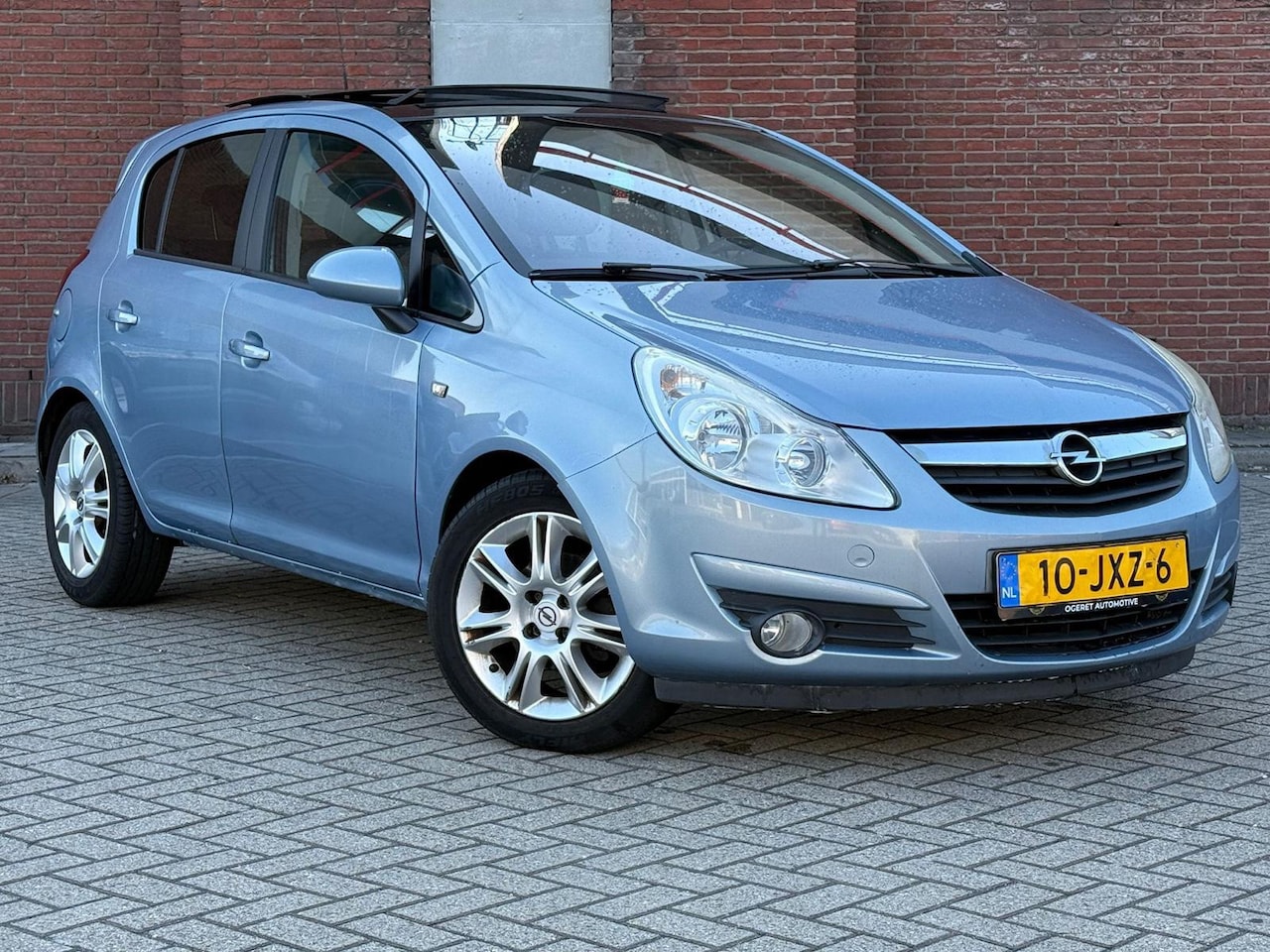 Opel Corsa - 1.4-16V Cosmo|5DRS|FULL-AUTOMAAT|AIRCO|PANO - AutoWereld.nl
