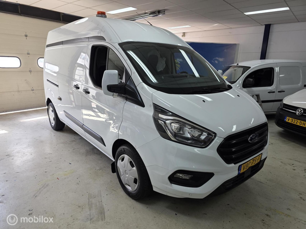 Ford Transit Custom - 320 2.0 TDCI L2H2 Airco Cruise - AutoWereld.nl