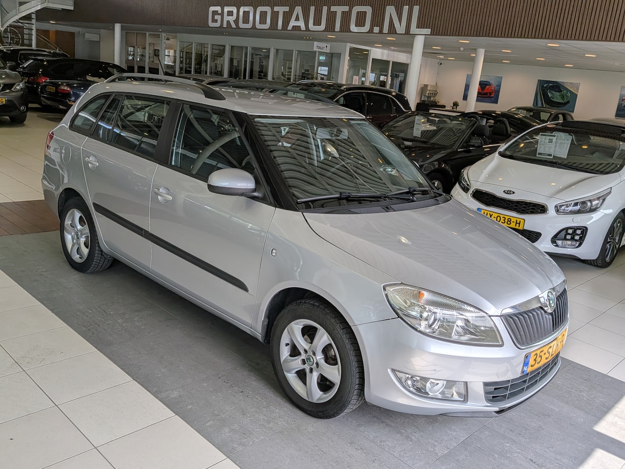 Skoda Fabia Combi - 1.2 TSI Ambition Airco, Cruise Control, Trekhaak, Stuurbekrachtiging - AutoWereld.nl