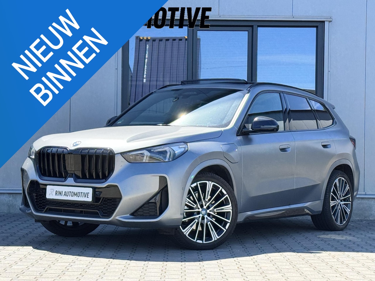 BMW X1 - xDrive30e 326 PK | High Executive | Pano | Frozen Grey | Trekhaak | Leder | 20 inch - AutoWereld.nl