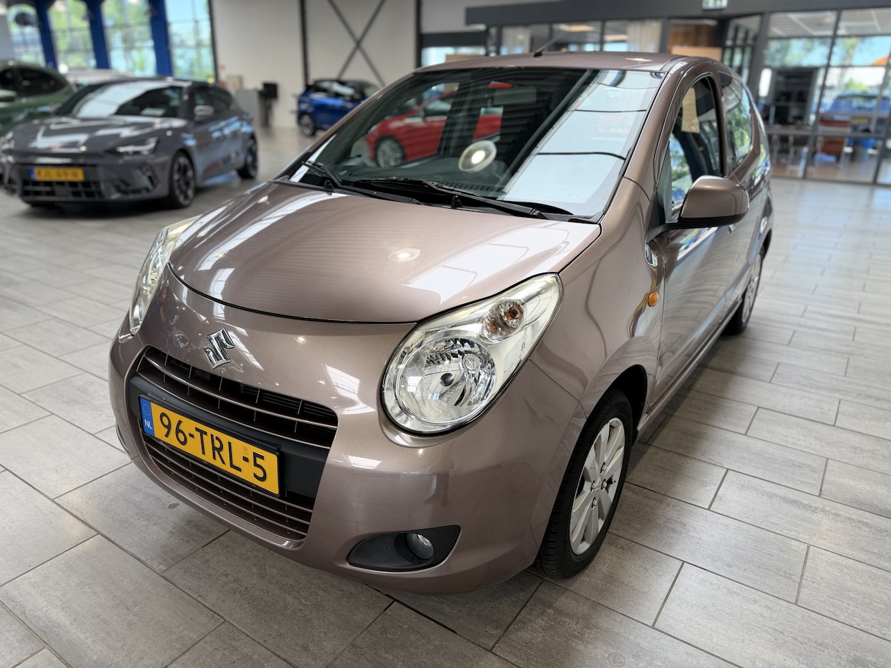 Suzuki Alto - 1.0 68 pk Exclusive | Airco | Centrale vergr. + afst. bed. | El. ramen | Lm velgen | 25,- - AutoWereld.nl