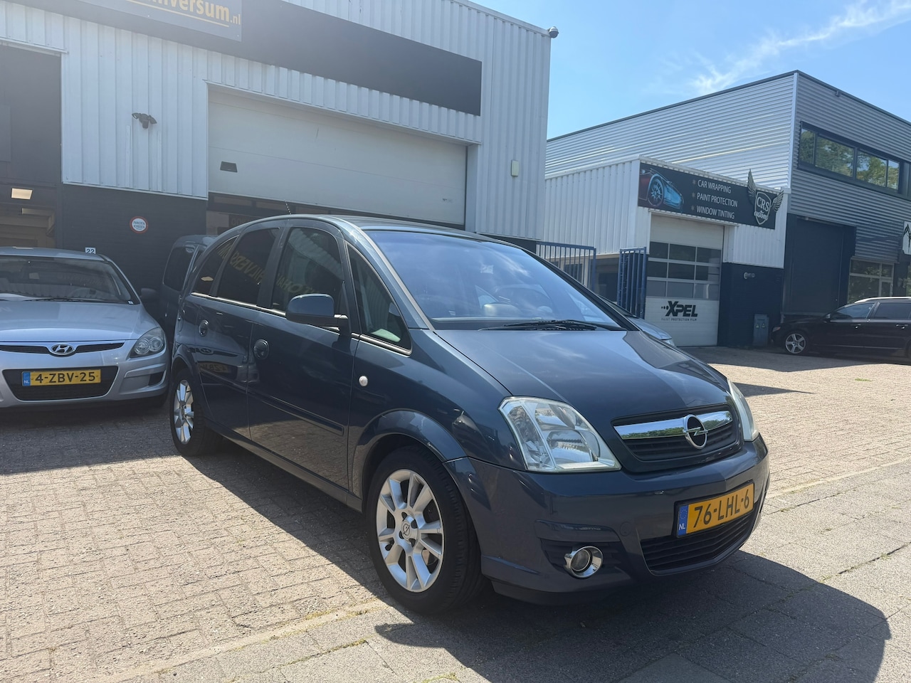 Opel Meriva - 1.6-16V Cosmo 1.6-16V Cosmo - AutoWereld.nl