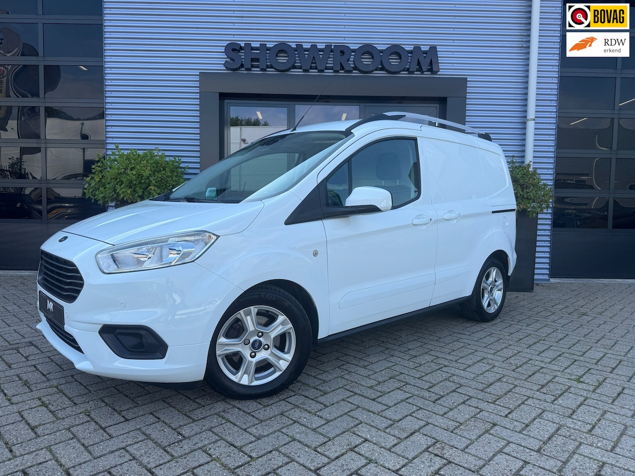 Ford Transit Courier - 1.0 NAVI grootbeeld|CLIMATECONTROL|CAMERA|CRUISE|STOELVERWARMING|CAMERA - AutoWereld.nl