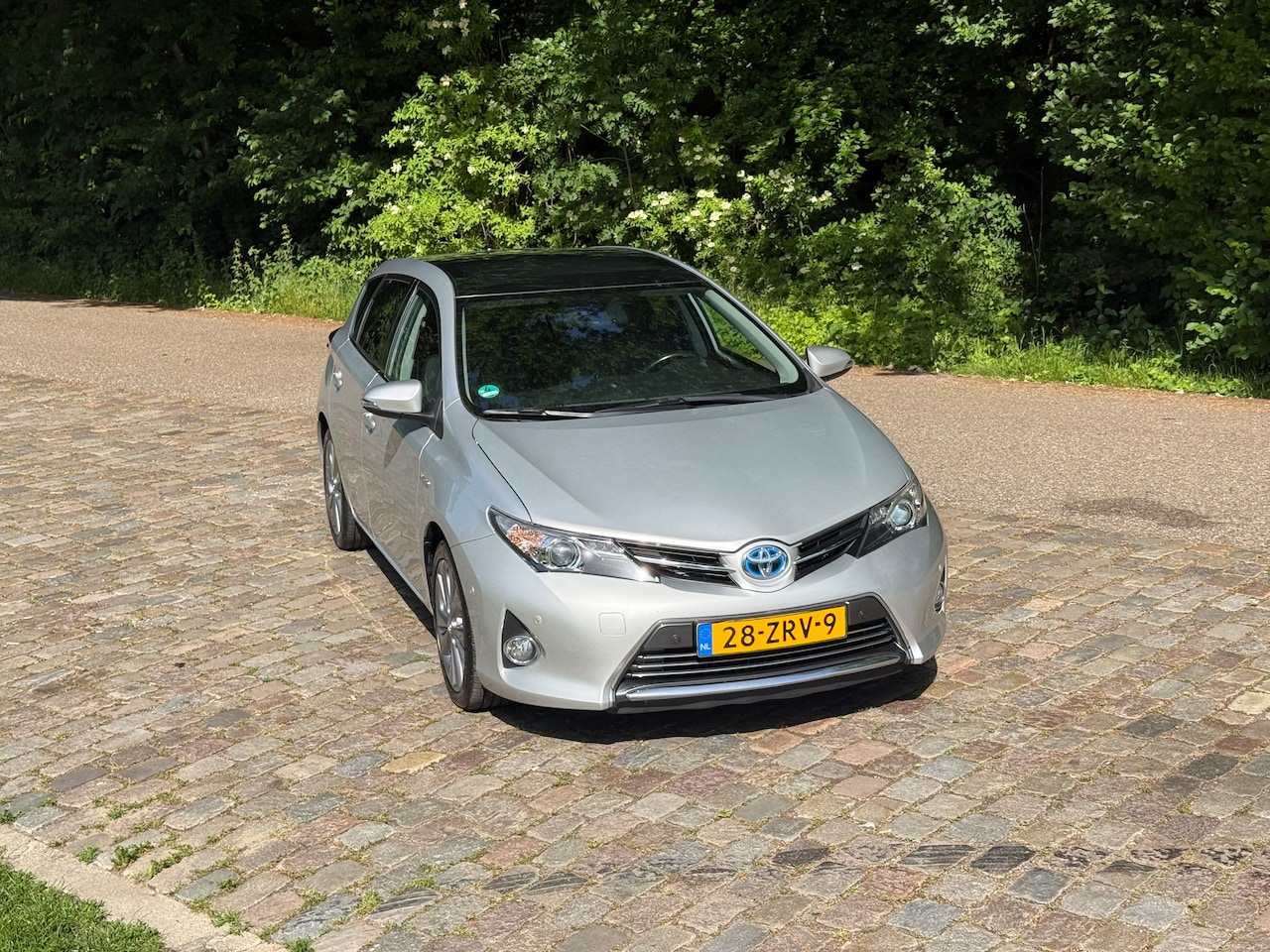 Toyota Auris - 1.8 Hybrid Executive ASPIRATION 1.8 FULL HYBRID PANO/AUT/LEER/NAVI/CAMERA/CLIMA/STOELVERWARMING/OR.KM STAND:64. - AutoWereld.nl