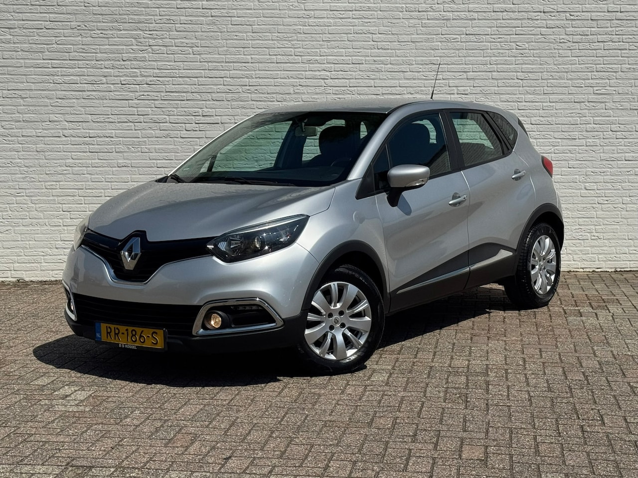 Renault Captur - 1.5 dCi Expression Navi Trekhaak Airco Cruisecontrol - AutoWereld.nl