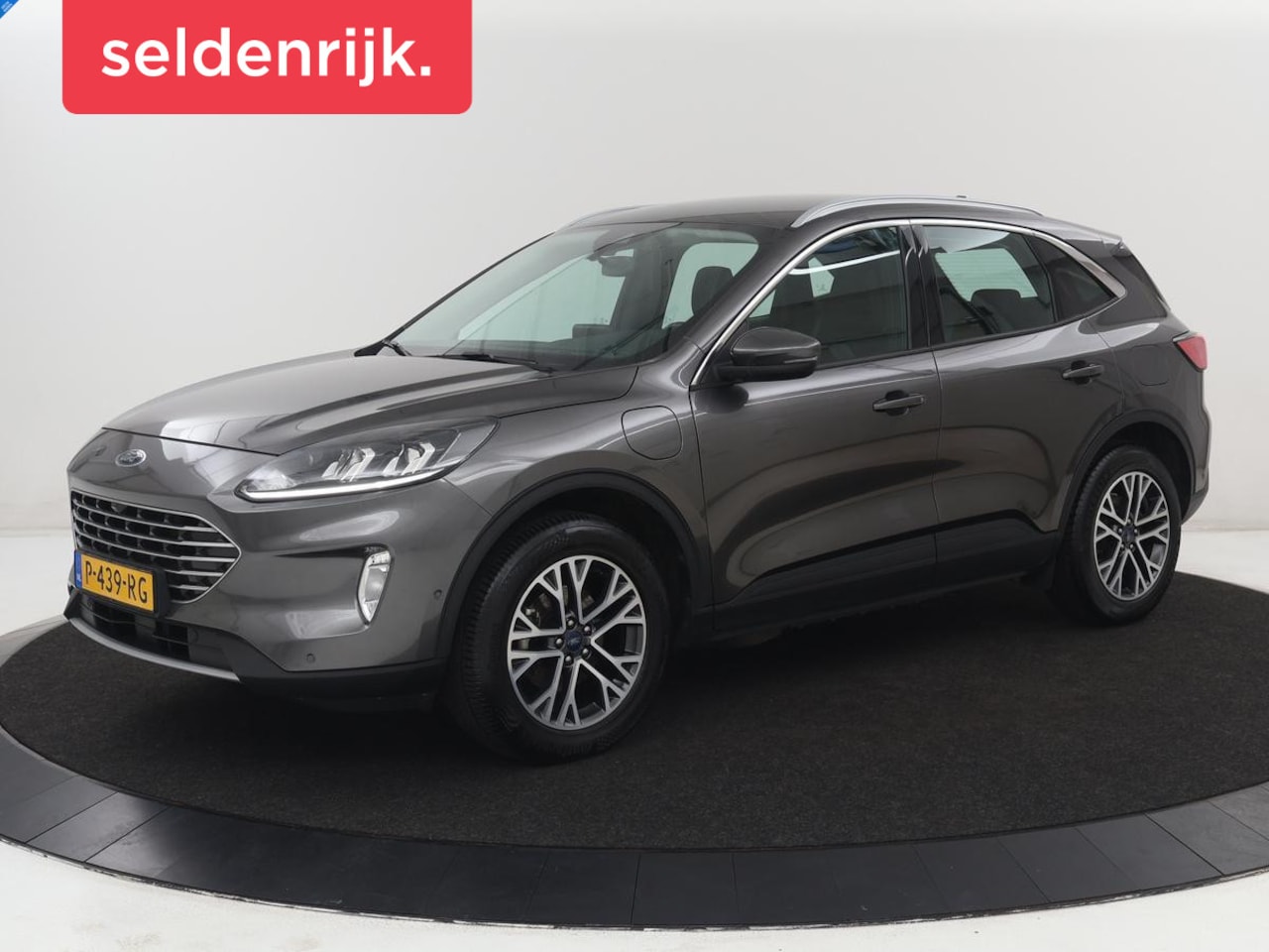 Ford Kuga - 2.5 PHEV Titanium | SOH 85,6% | Trekhaak | Stoelverwarming | Camera | Adaptive cruise | Si - AutoWereld.nl