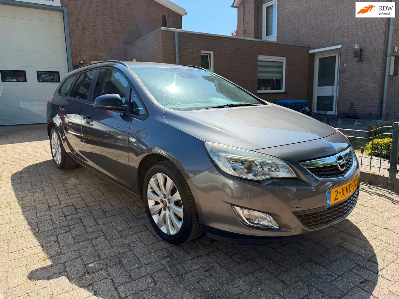 Opel Astra Sports Tourer - 1.4 Turbo Sport 1.4 Turbo Sport - AutoWereld.nl