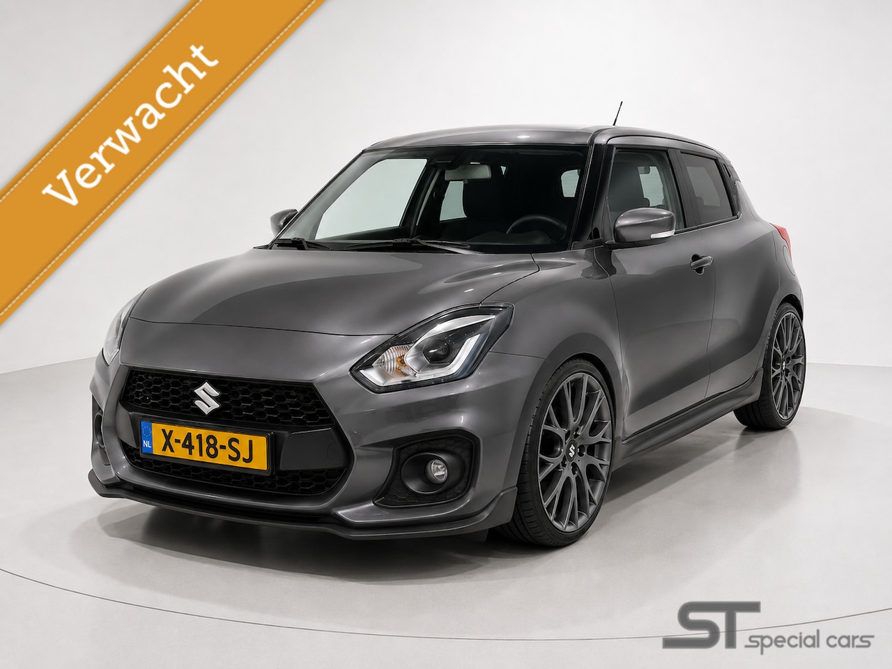 Suzuki Swift - 1.4 Sport Smart Hybrid|Miltek|Forge|184 Pk - AutoWereld.nl