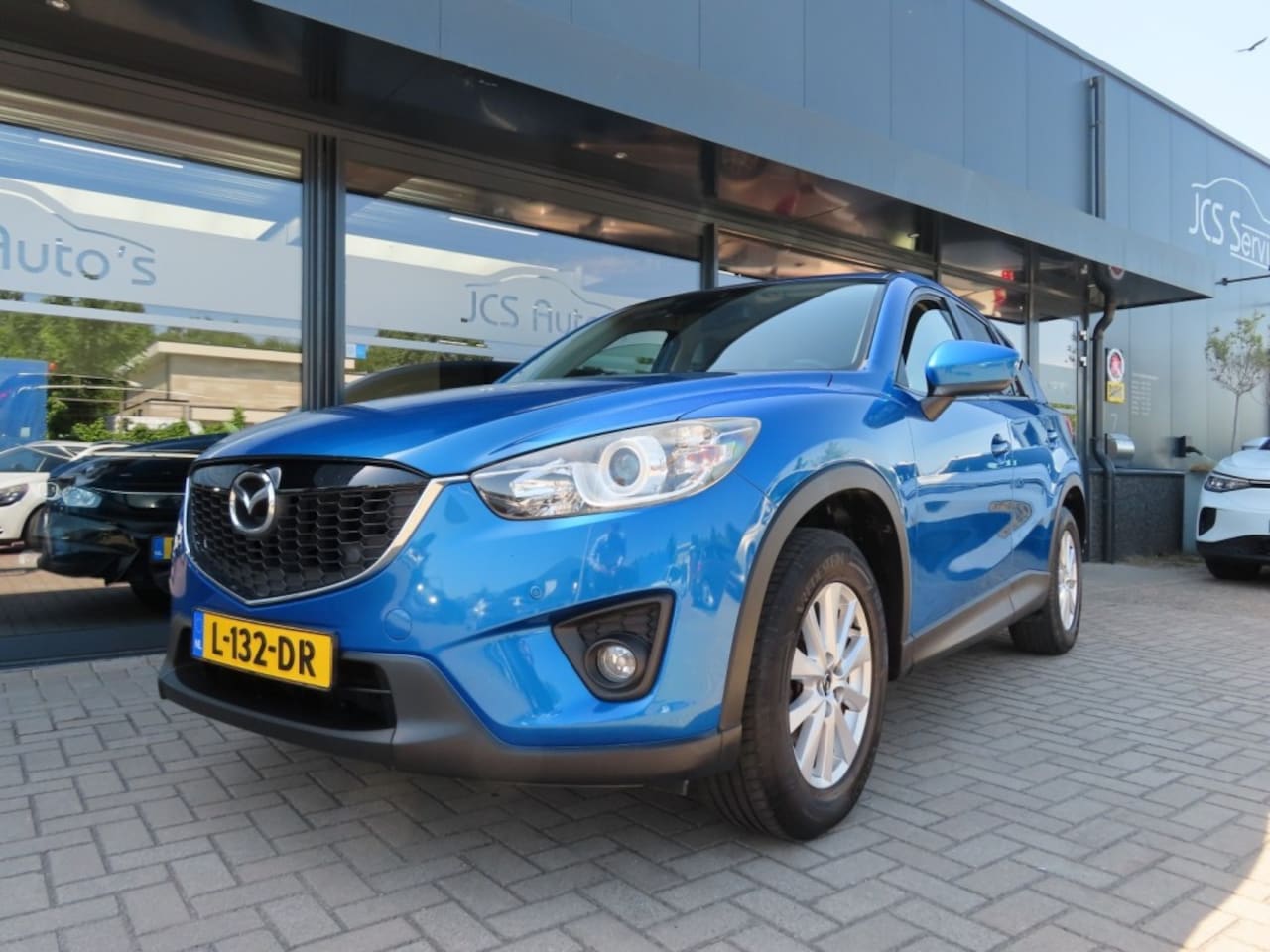 Mazda CX-5 - 2.0 TS+ 2WD Ecc Cruise 2x Pdc Trekhaak 2012 - AutoWereld.nl