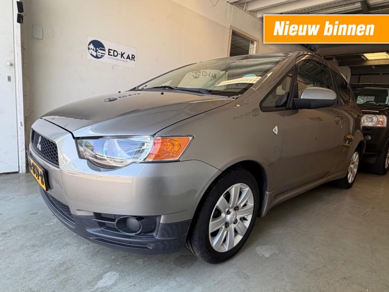 Mitsubishi Colt - 1.3 Edition Two KOUFE AIRCO LMV NETTE AUTO APK - AutoWereld.nl
