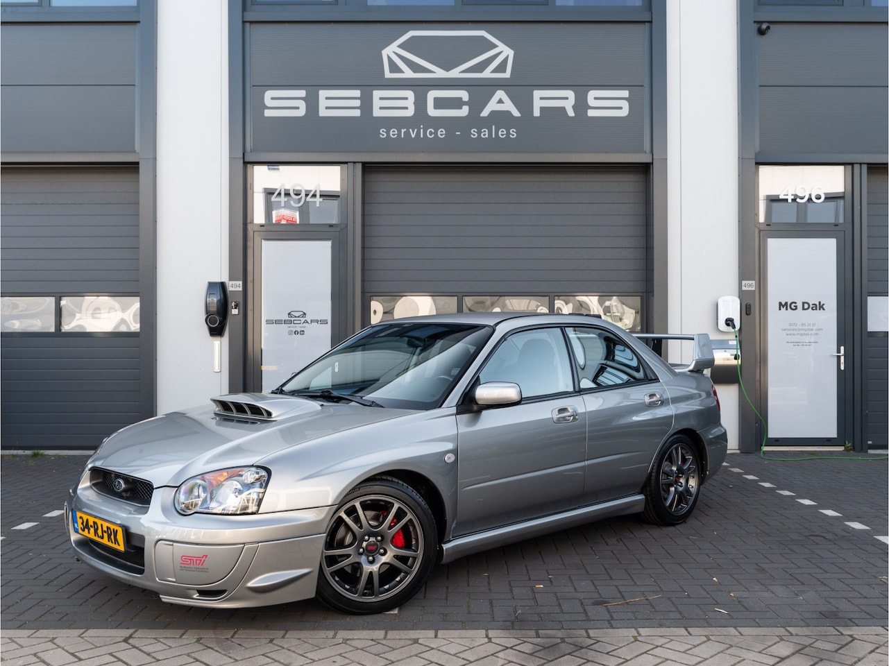 Subaru Impreza - 2.0 WRX AWD UNIEK EN IN ZEER GOEDE STAAT! STI LOOK, SPORTUITLAAT, APPLE CARPLAY - AutoWereld.nl
