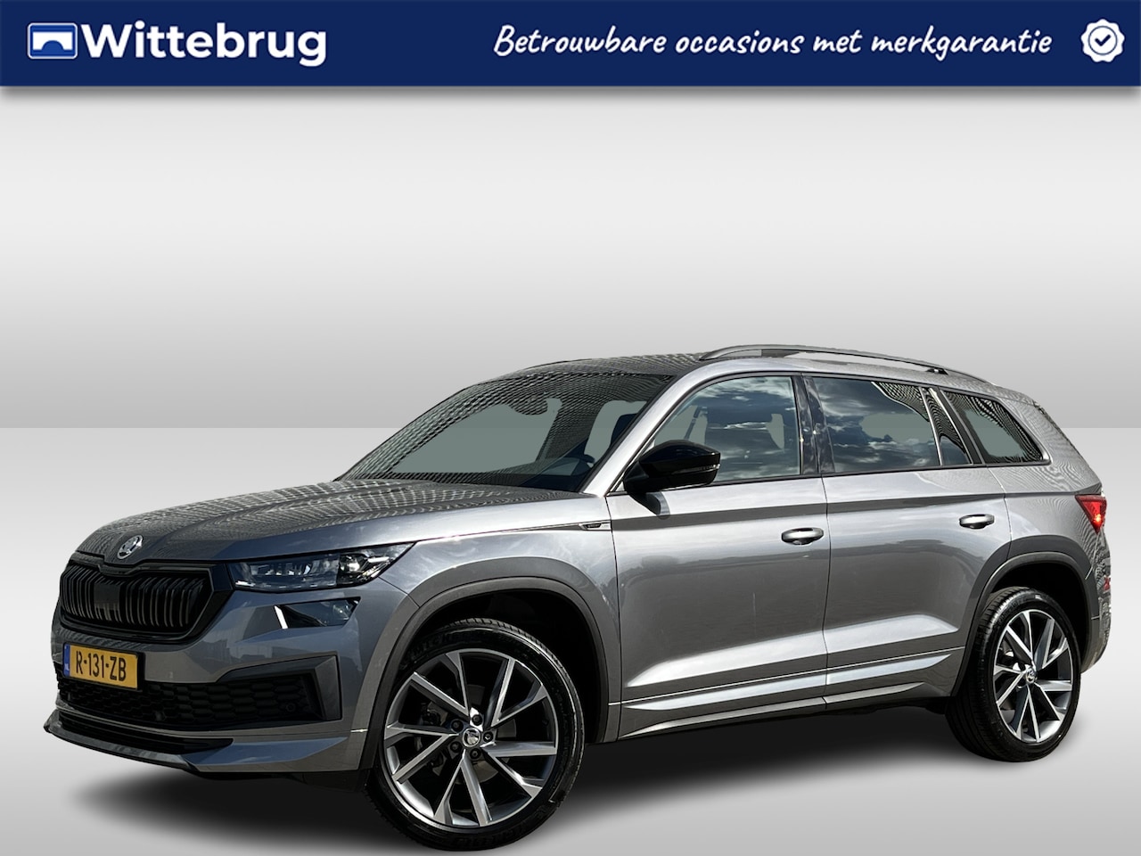 Skoda Kodiaq - 1.5 TSI Sportline Business / Pano / Navigatie / Camera / Parkeersensoren V+A / App connect - AutoWereld.nl