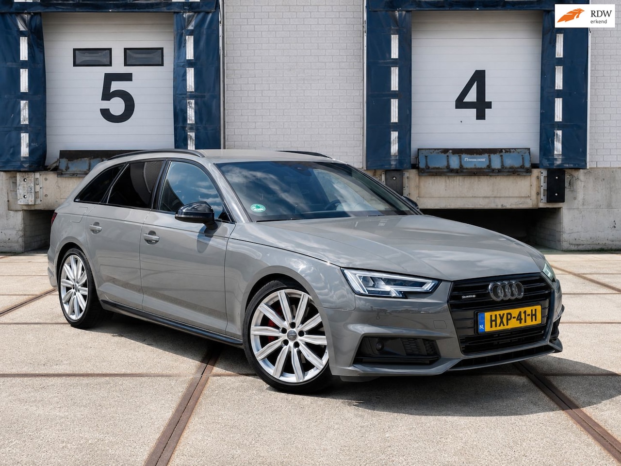 Audi A4 Avant - 2.0 TFSI MHEV quattro Sport S line black edition (FULL OPTEI) - AutoWereld.nl