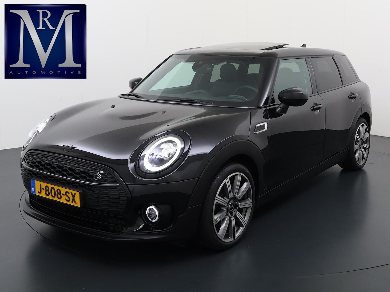 MINI Clubman - 1.5 Cooper Richmond Park Edition | PANORAMA DAK | CAMERA| STOELVERW. | LEER| KEYLESS| ORIG - AutoWereld.nl