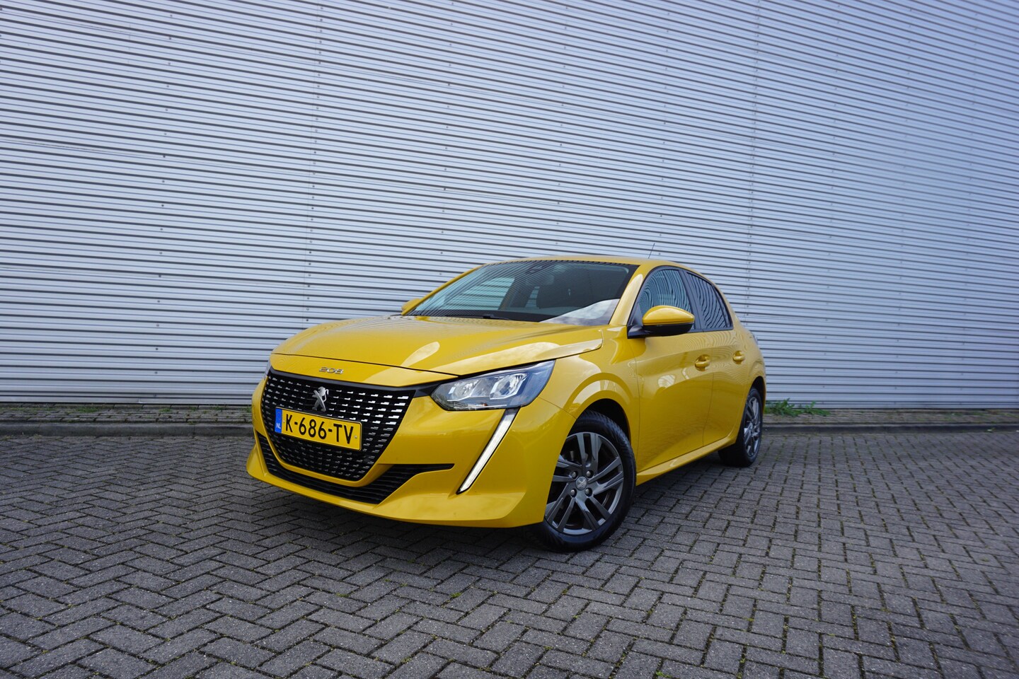 Peugeot 208 - 1.2 PureTech Blue Lease Active Climate / Navi / Cruise / Parkeers. / CARPLAY / Elektr. ram - AutoWereld.nl
