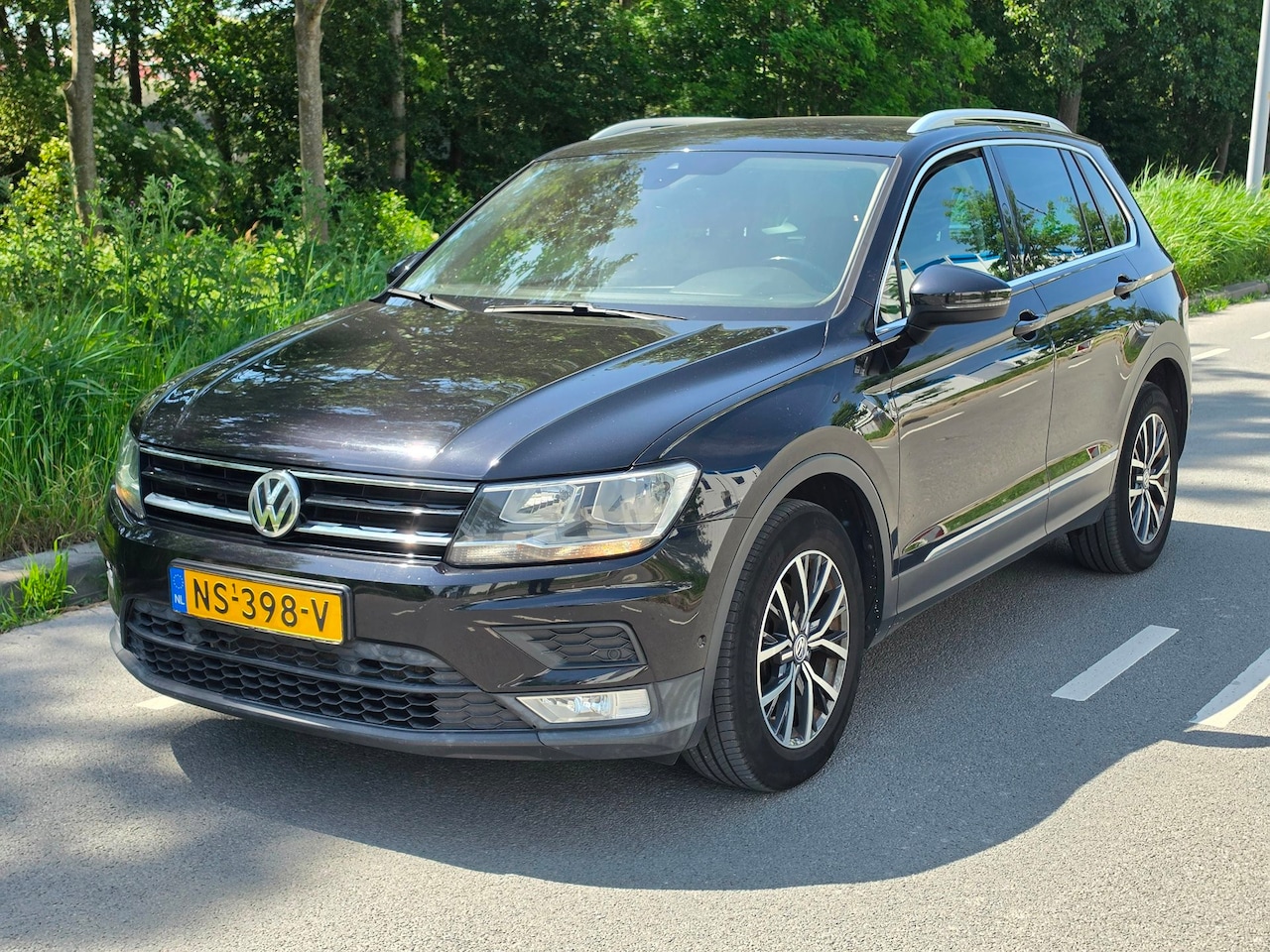 Volkswagen Tiguan - 2.0 TDI Comfortline Business / AIRCO / DSG - AutoWereld.nl