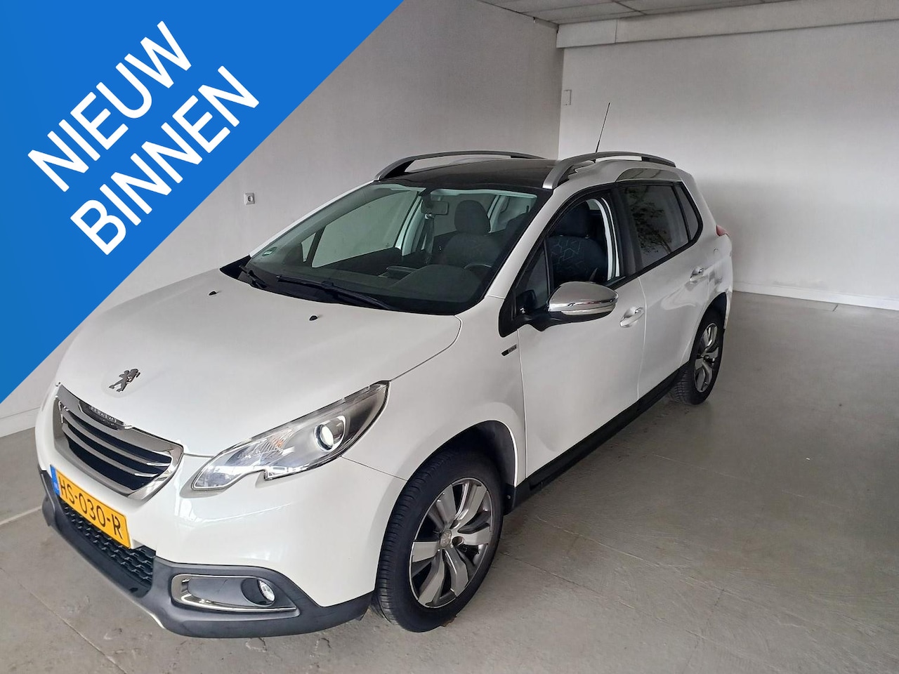 Peugeot 2008 - 1.2 Style - AutoWereld.nl