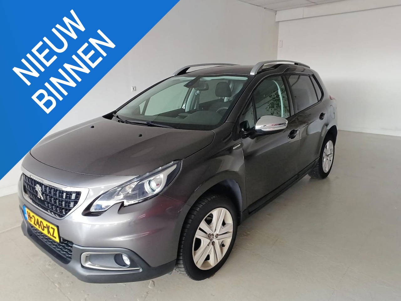 Peugeot 2008 - 1.2 Style - AutoWereld.nl