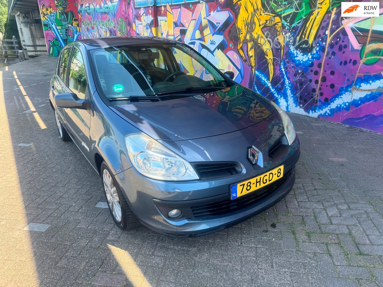 Renault Clio - 1.2-16V Special Rip Curl zeer mooie auto rijd heerlijk onderhoud historie aanwezig airco e - AutoWereld.nl