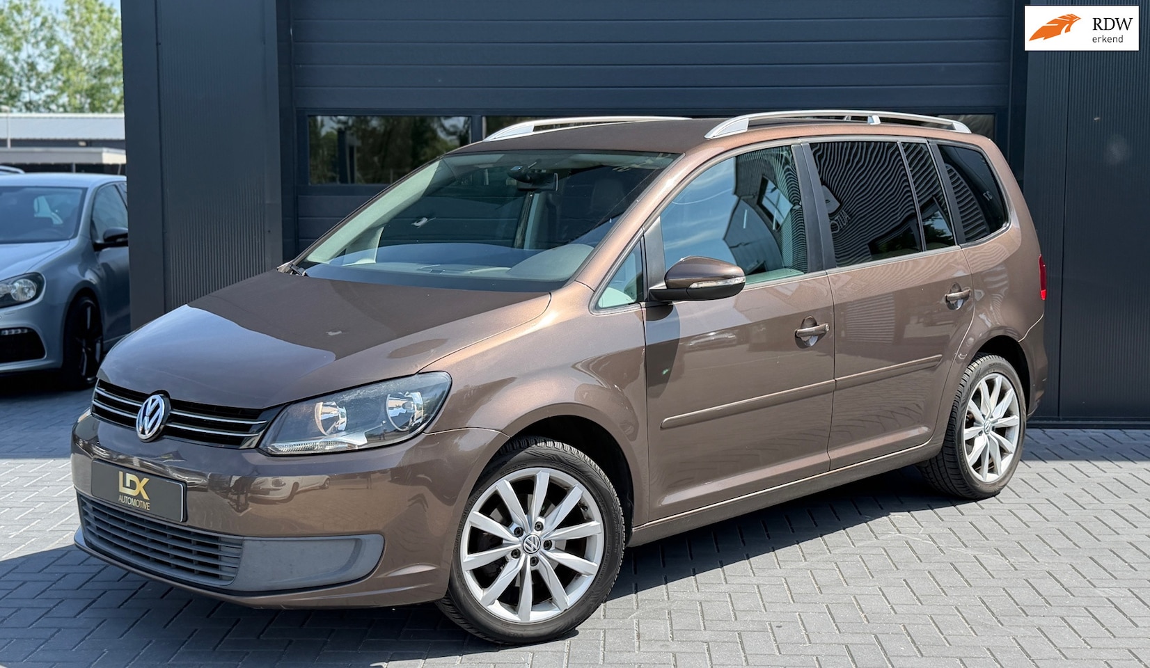 Volkswagen Touran - 1.4 TSI Highline 7p 1.4 TSI Highline 7p. - AutoWereld.nl
