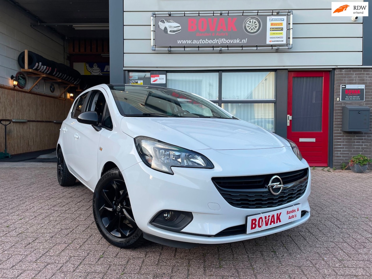 Opel Corsa - 1.4i 16v Black & White Edition - AutoWereld.nl