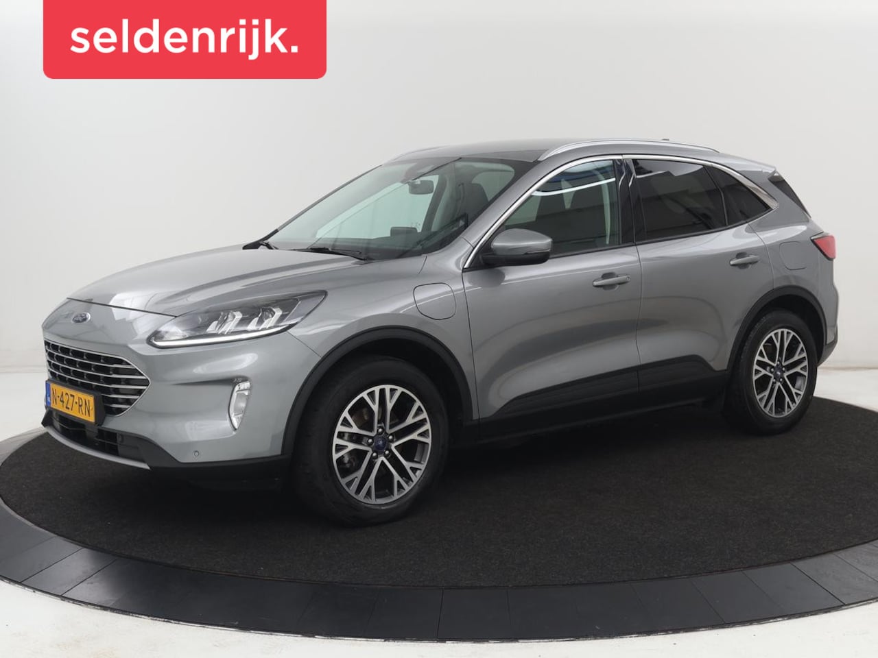 Ford Kuga - 2.5 PHEV Titanium | SOH 87,5% | Trekhaak | Camera | Carplay | Navigatie | Climate control - AutoWereld.nl