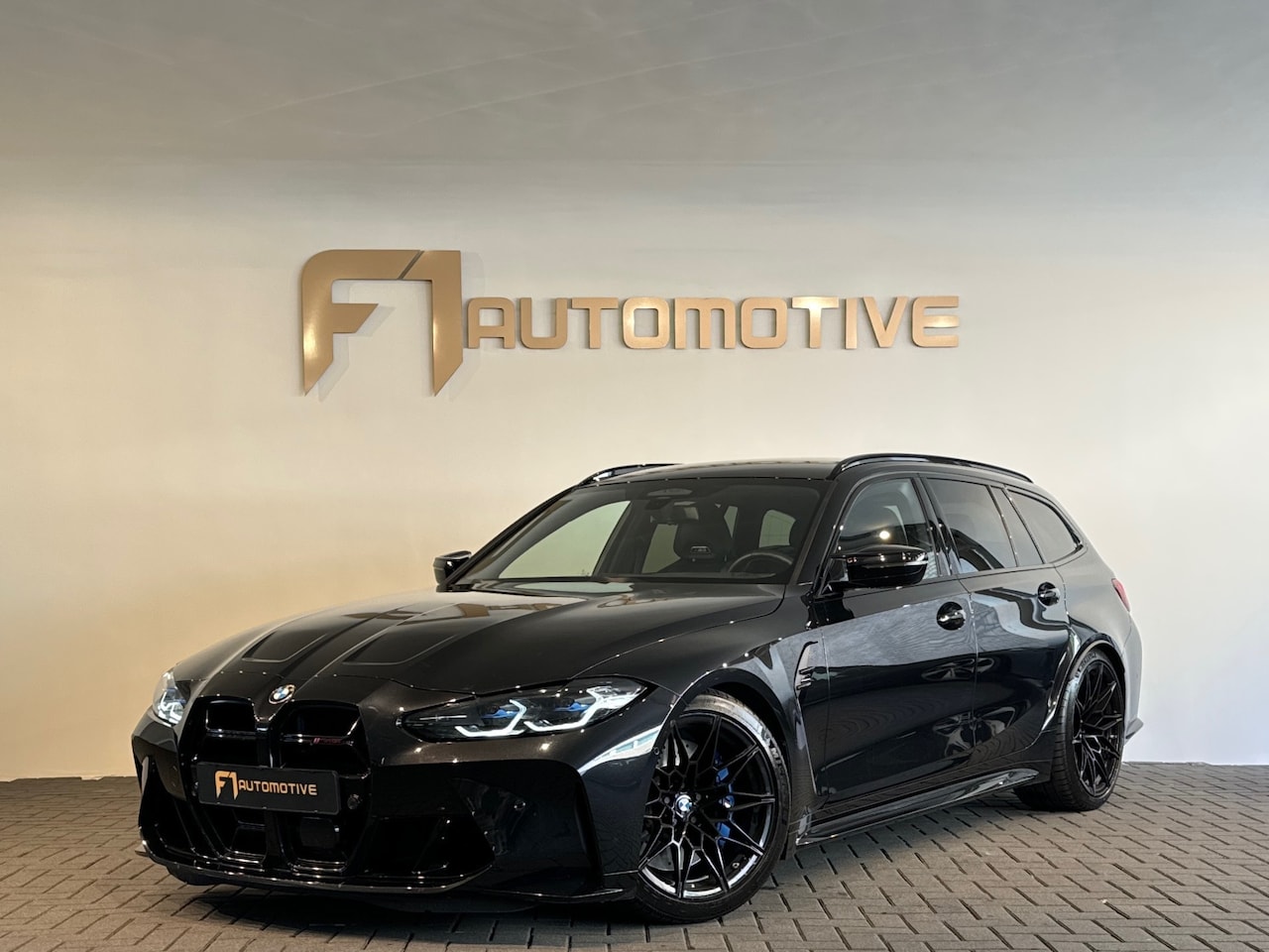 BMW 3-serie Touring - M3 xDrive Competition Milltek|H/K|HuD - AutoWereld.nl