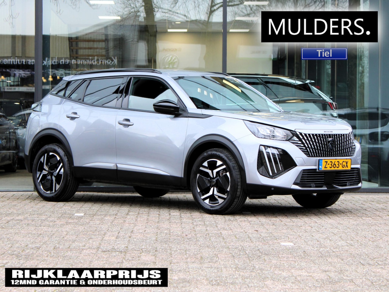 Peugeot 2008 - 1.2 PureTech 100 Allure | Navi / Camera / Climate - AutoWereld.nl