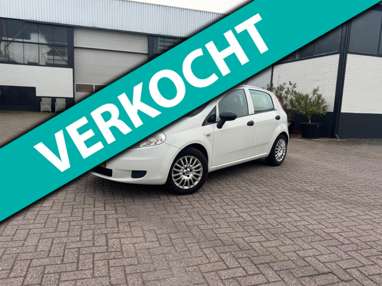 Fiat Grande Punto - 1.3 M-Jet Actual Airco 5 deurs - AutoWereld.nl