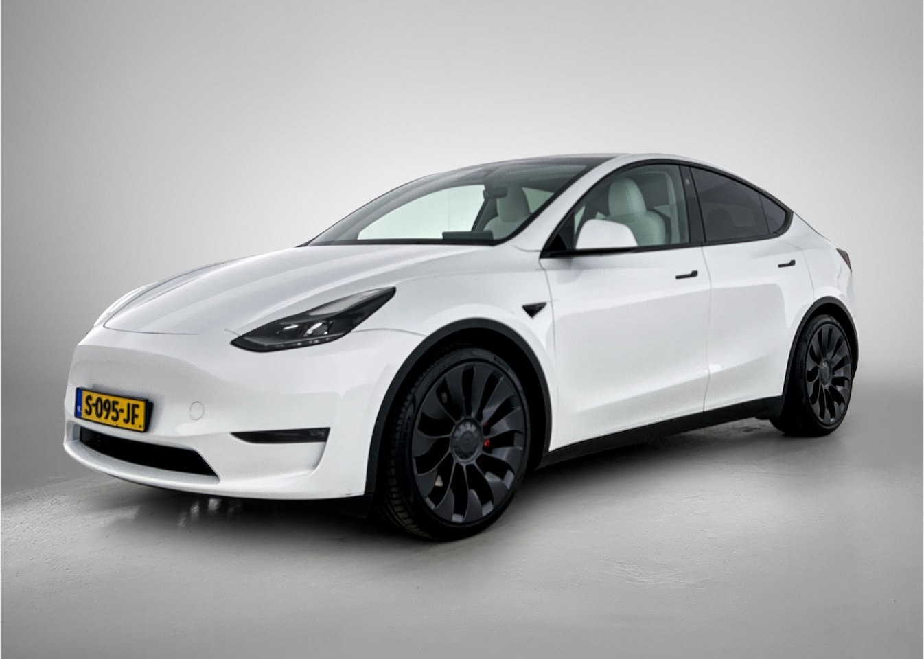 Tesla Model Y - Performance AWD 75 kWh Leder | Parkeercamera | Schuif-kanteldak - AutoWereld.nl