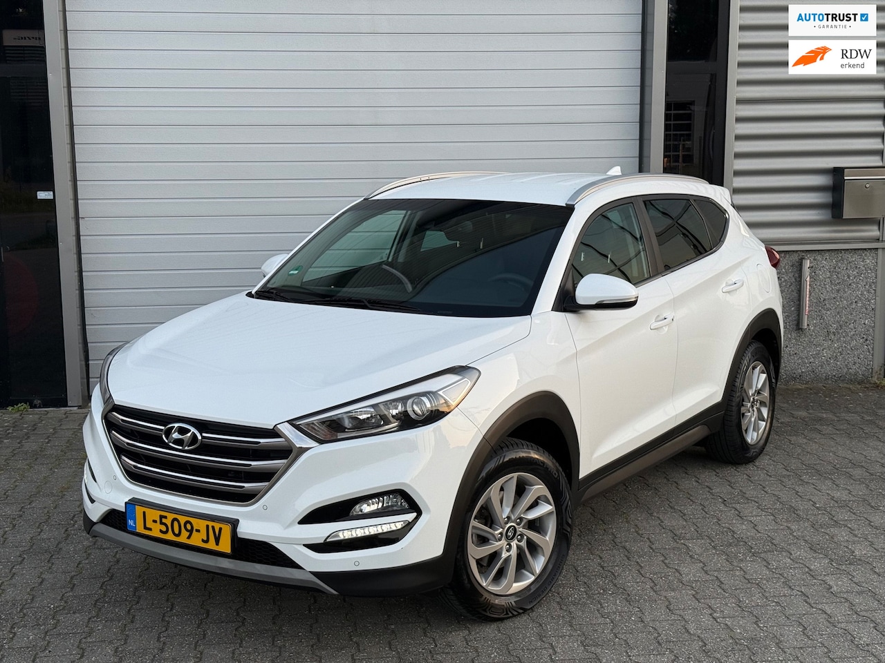 Hyundai Tucson - 1.6 GDi Leder Camera Trekhaak Led Elektrische stoelen - AutoWereld.nl