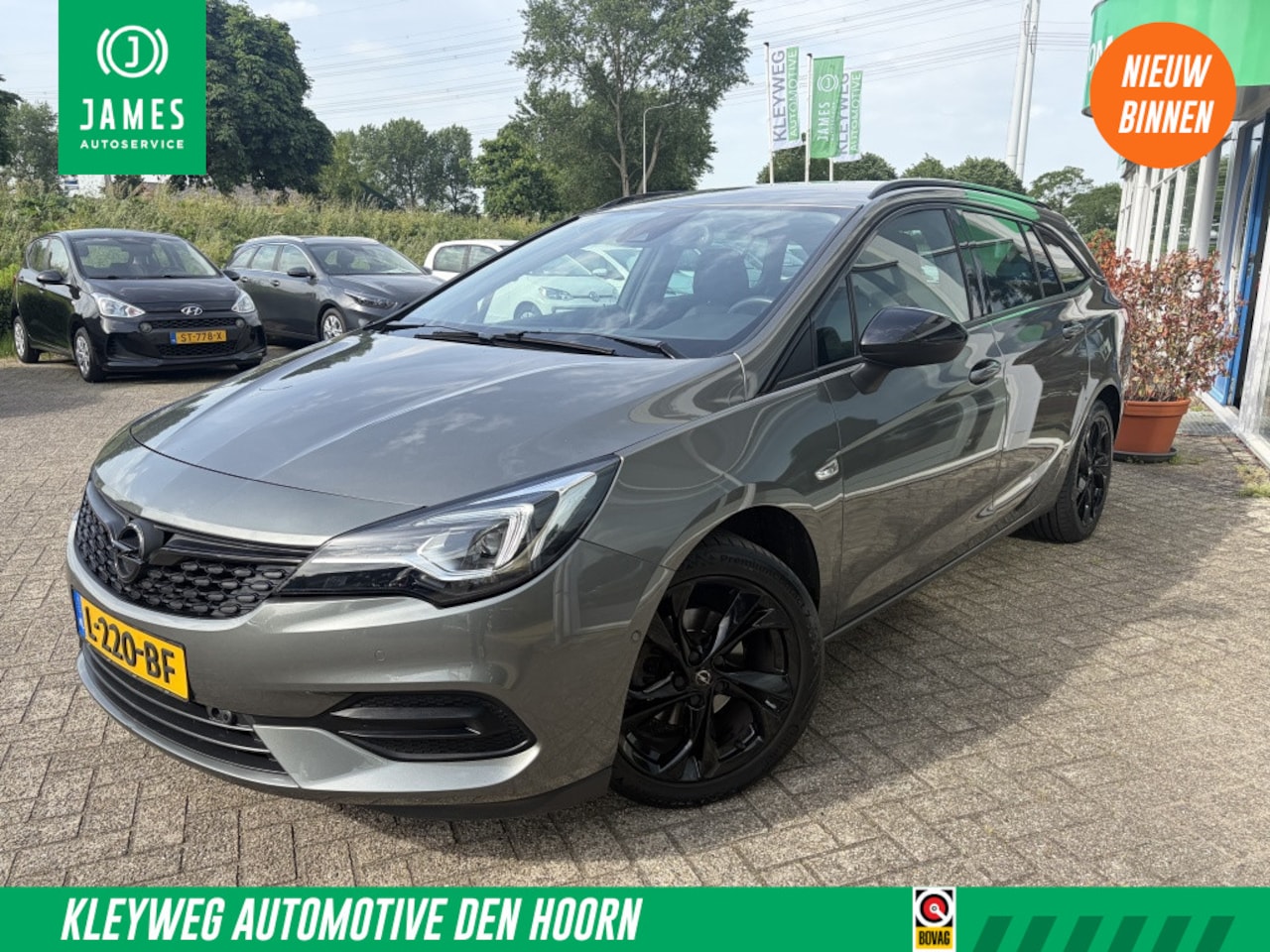 Opel Astra Sports Tourer - 1.2 Bns Elegance, 130pk Nav, Carplay, Trekhaak, Stoelverw. - AutoWereld.nl