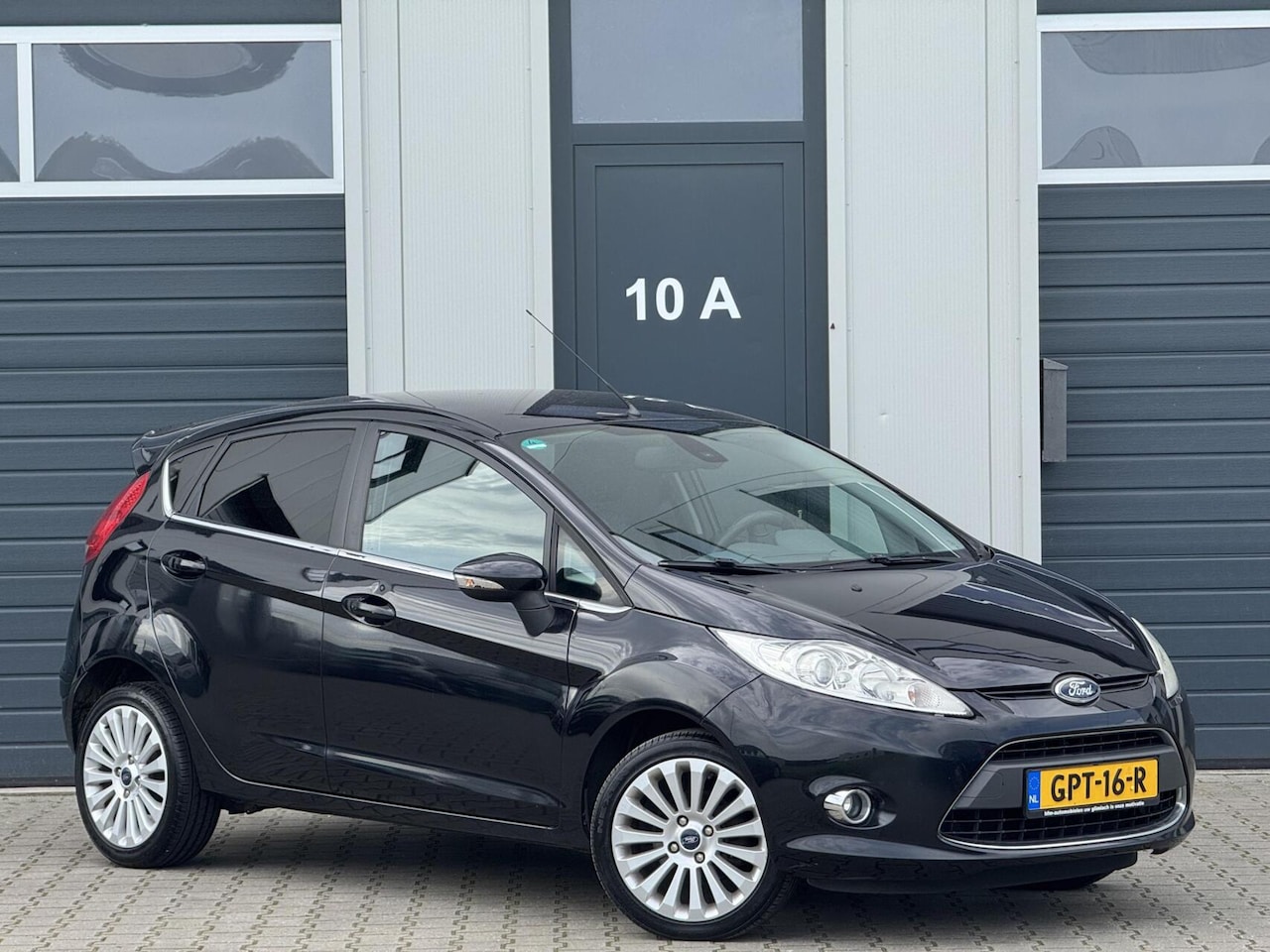 Ford Fiesta - 1.4 Titanium / Cruise / 5deurs / Airco - AutoWereld.nl