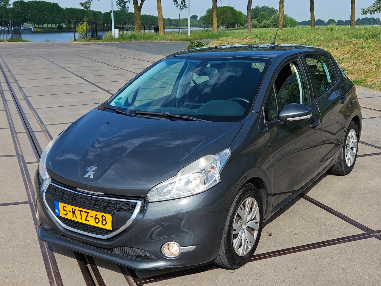 Peugeot 208 - 1.2 Vti Envy 1.2 VTi Envy - AutoWereld.nl