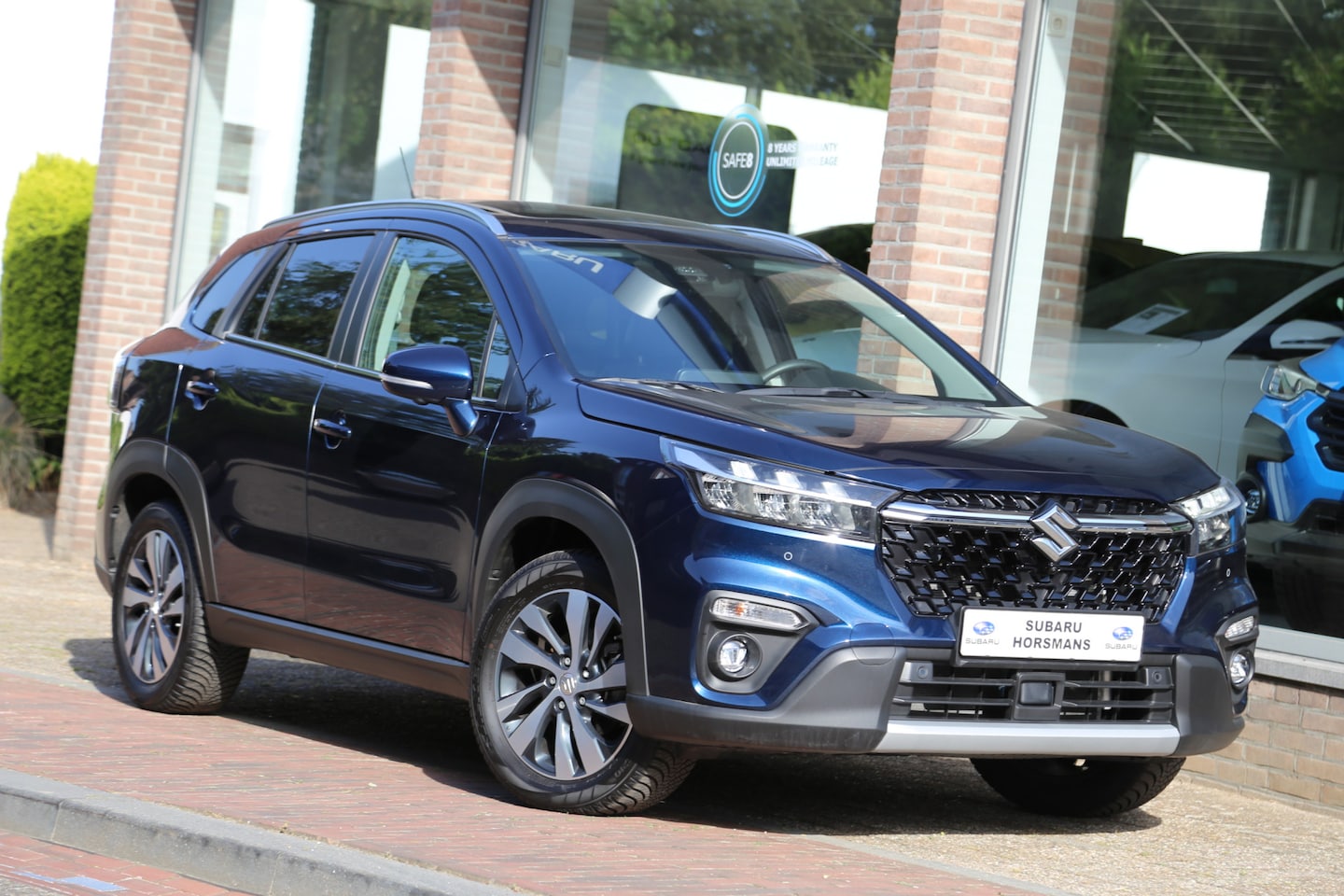 Suzuki S-Cross - 1.5 Hybrid Automaat Style ALLGRIP Schuifdak 360view Navi ACC - AutoWereld.nl