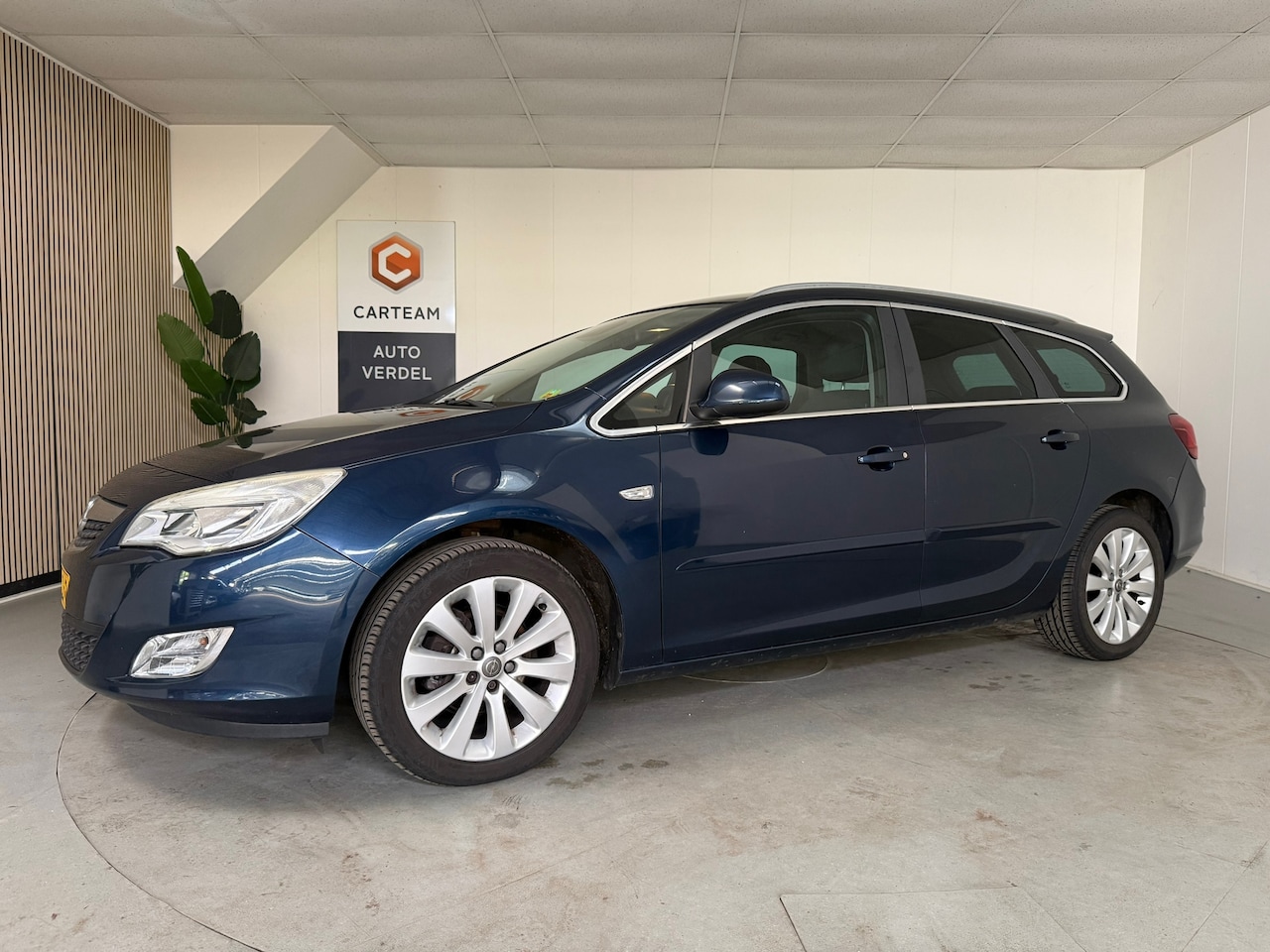 Opel Astra Sports Tourer - 1.4 Turbo Sport Airco, Navigatie, Trekhaak, LMV - AutoWereld.nl