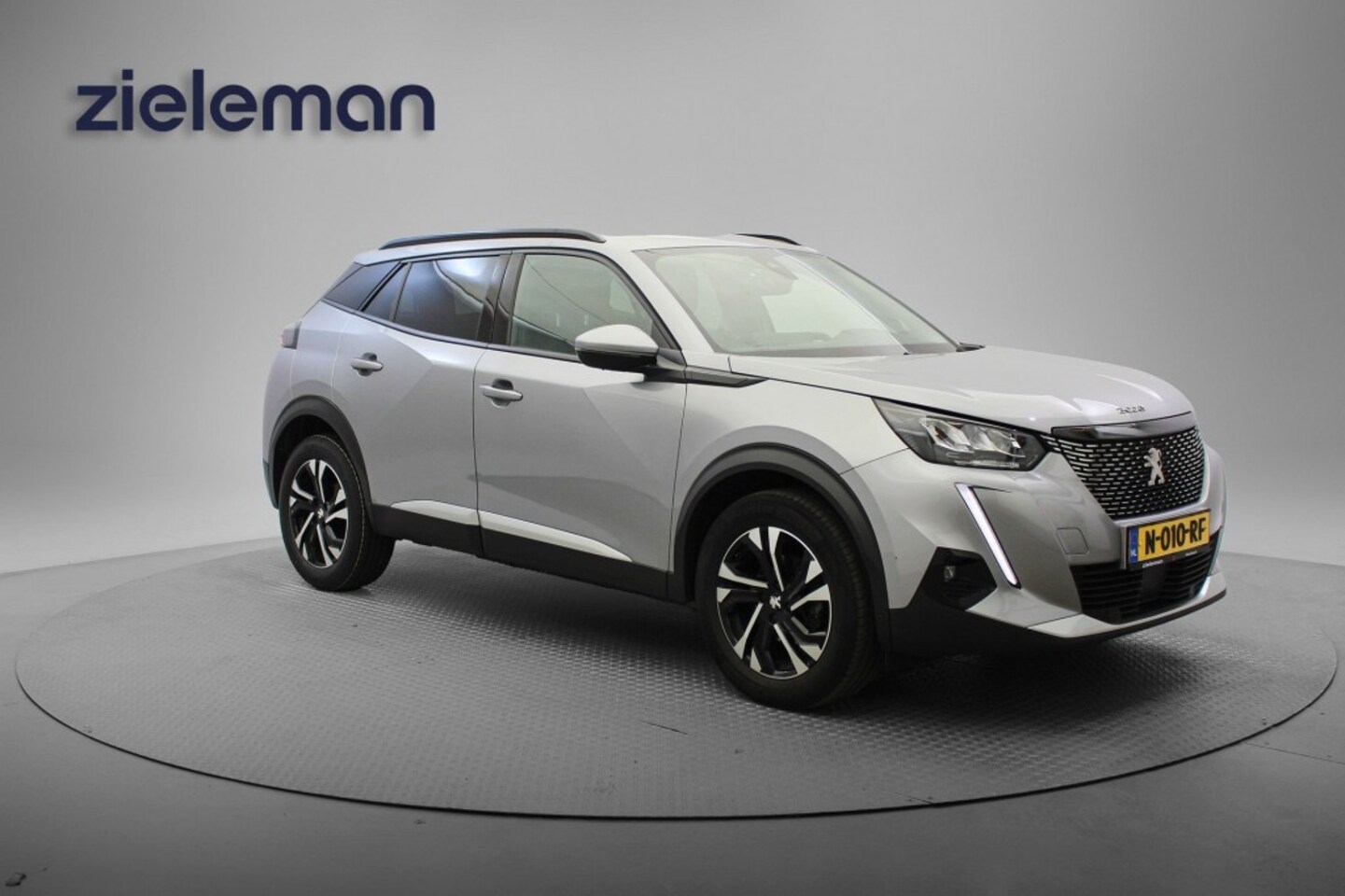 Peugeot 2008 - 1.2 PureTech 100 Allure - Carplay, Camera, Cruise, Half Leer, Afn. Trekhaak - AutoWereld.nl