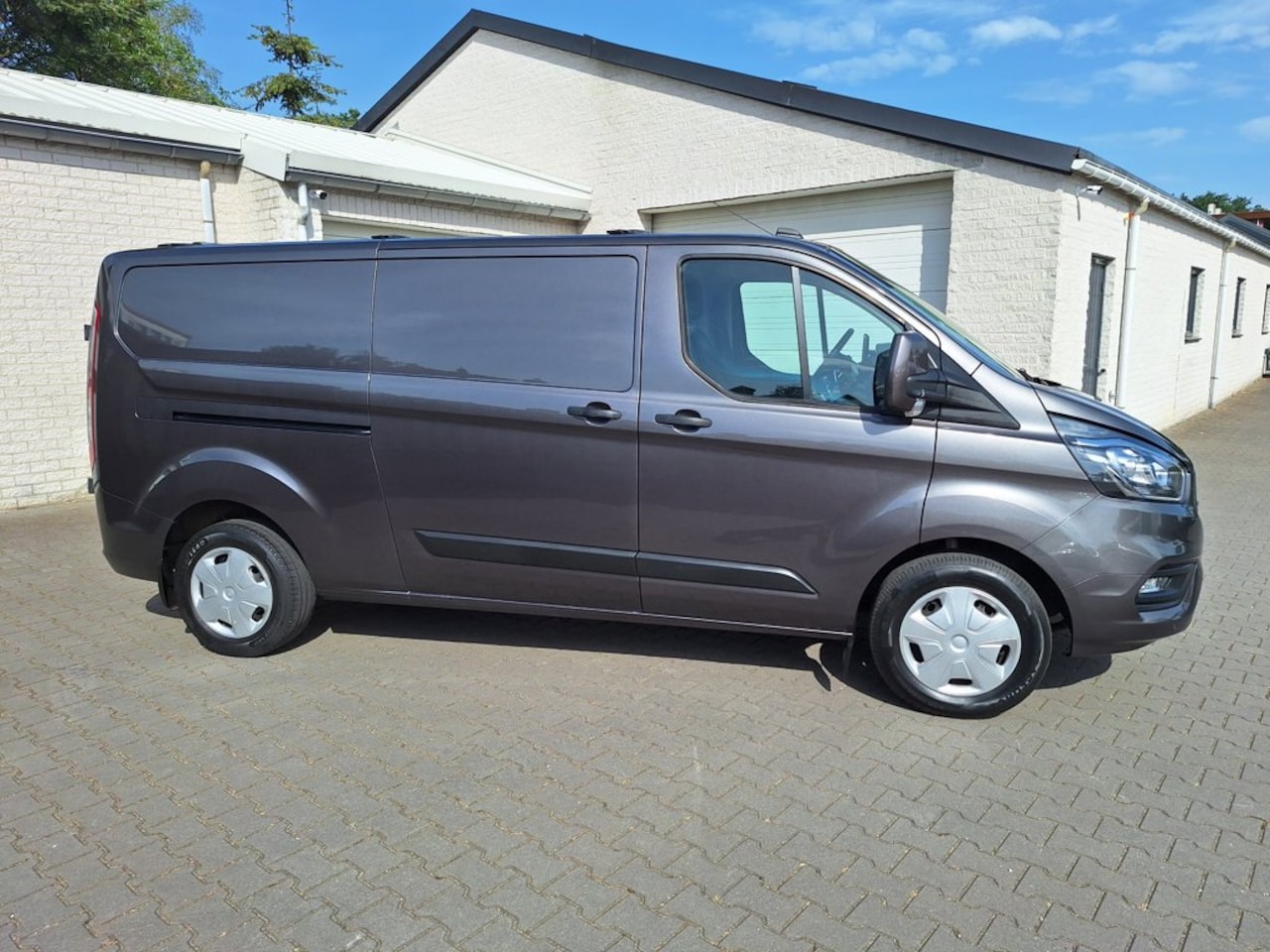 Ford Transit Custom - 320 2.0 TDCI L2H1 Trend 2800kg trekken - AutoWereld.nl