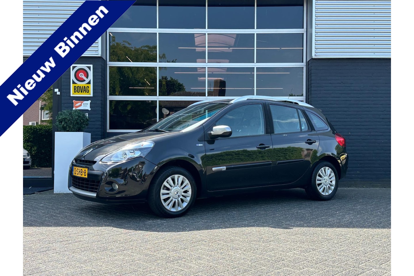Renault Clio Estate - 1.2-16V Night & Day, Airco, Cruise, Radio, Navi, NAP, APK - AutoWereld.nl
