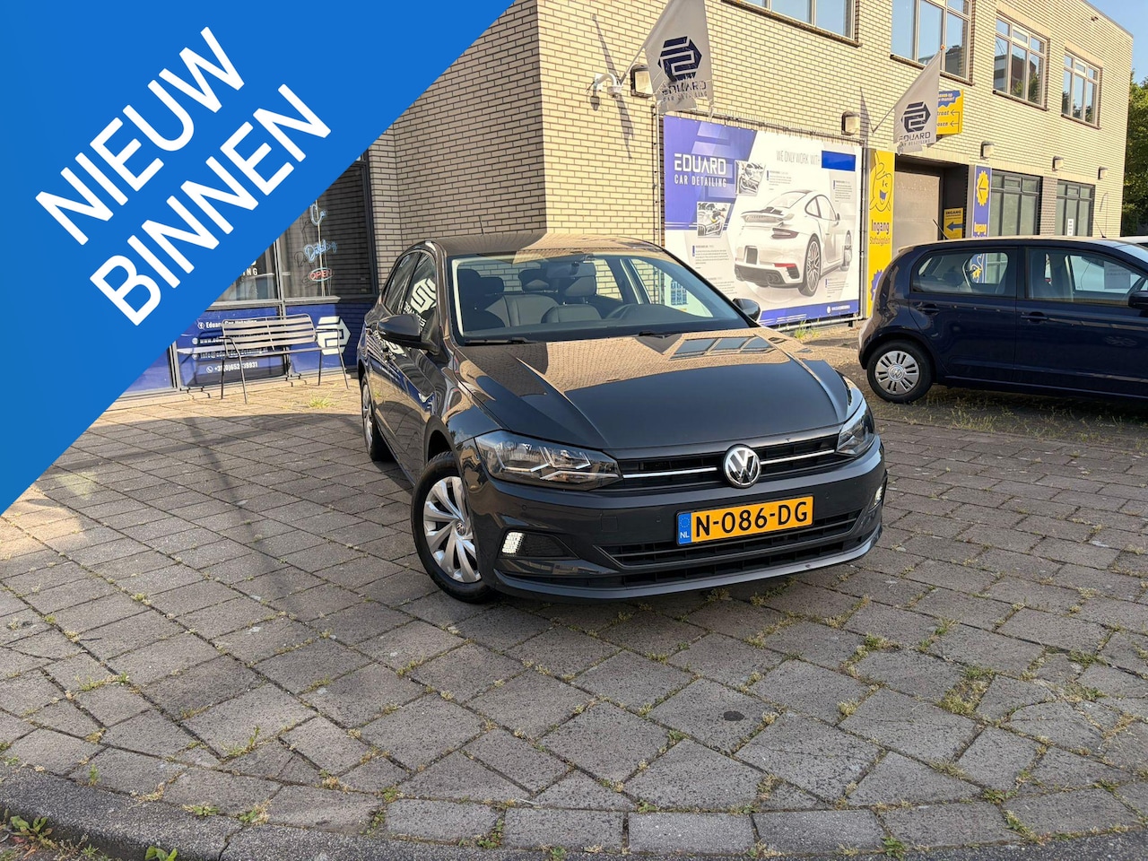 Volkswagen Polo - 1.0 TSI Comfortline Business Adaptive cruise/Airco/Groot multimedia scherm - AutoWereld.nl