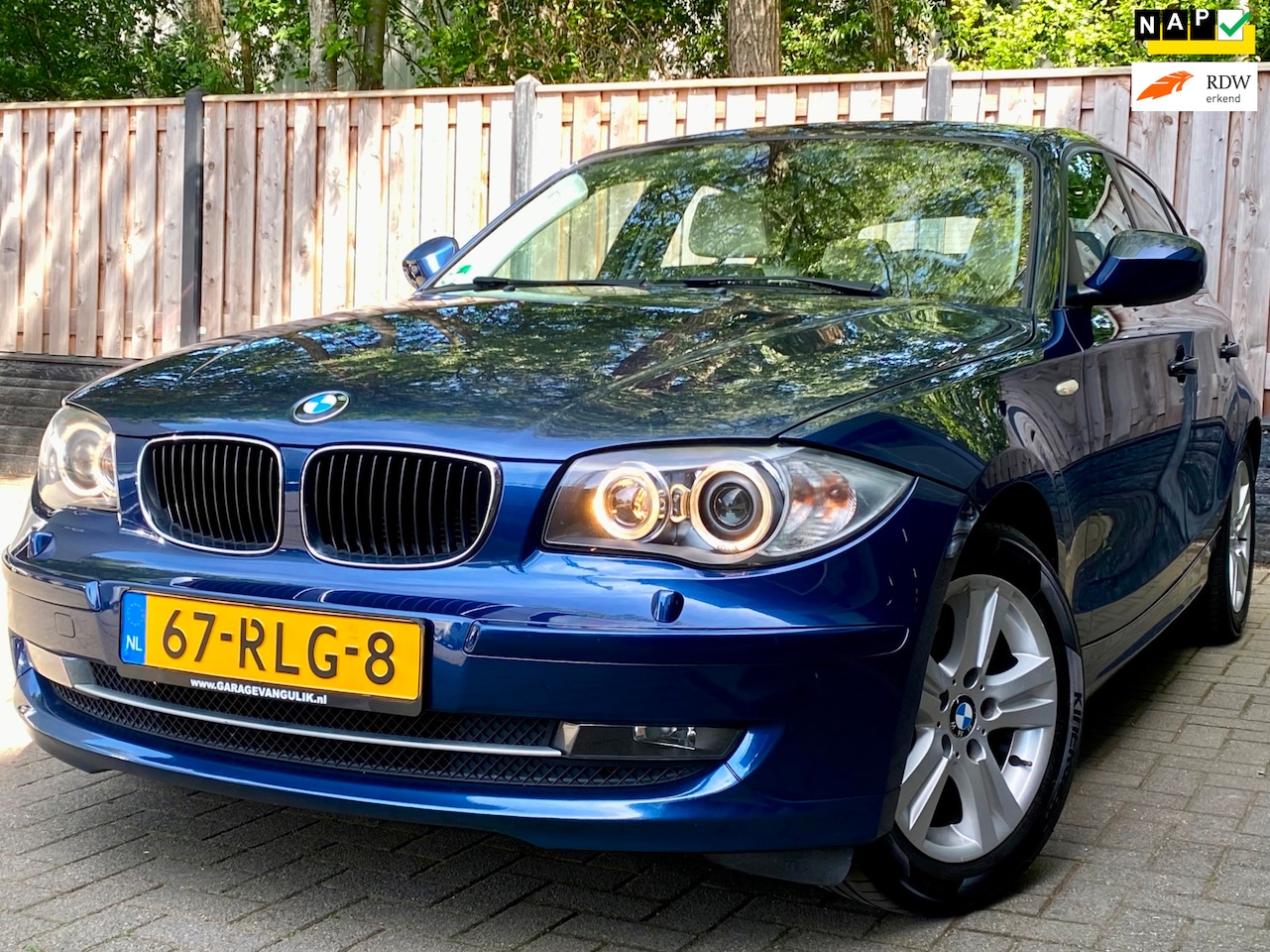 BMW 1-serie - 116i Business Line Ultimate Edition NL Auto I APK I NAVI I AUTOMAAT I LEER I CRUISE I LMV - AutoWereld.nl