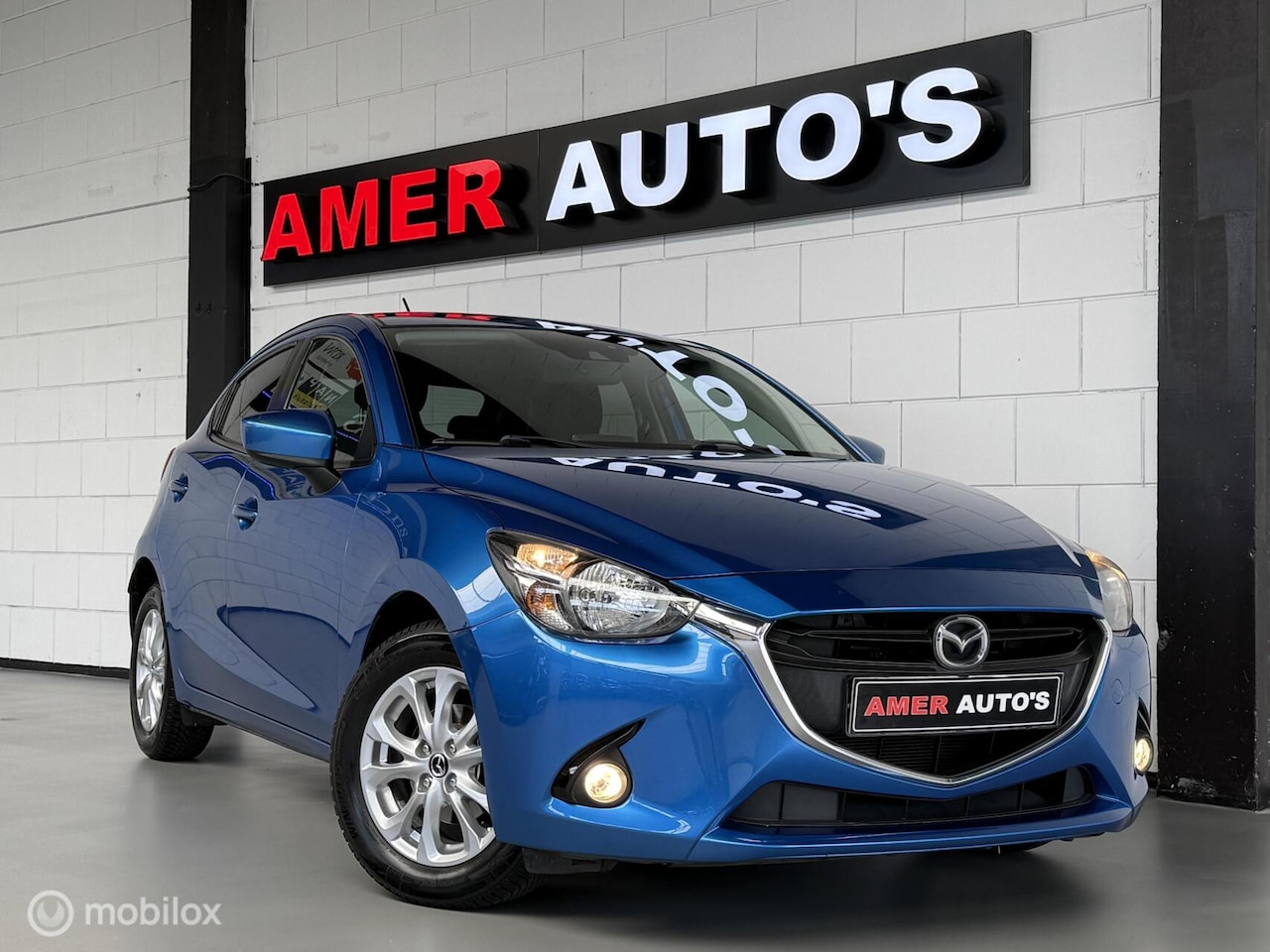 Mazda 2 - 1.5 Skyactiv-G/1e eign./Zeer nette staat/Navi/LageKM - AutoWereld.nl