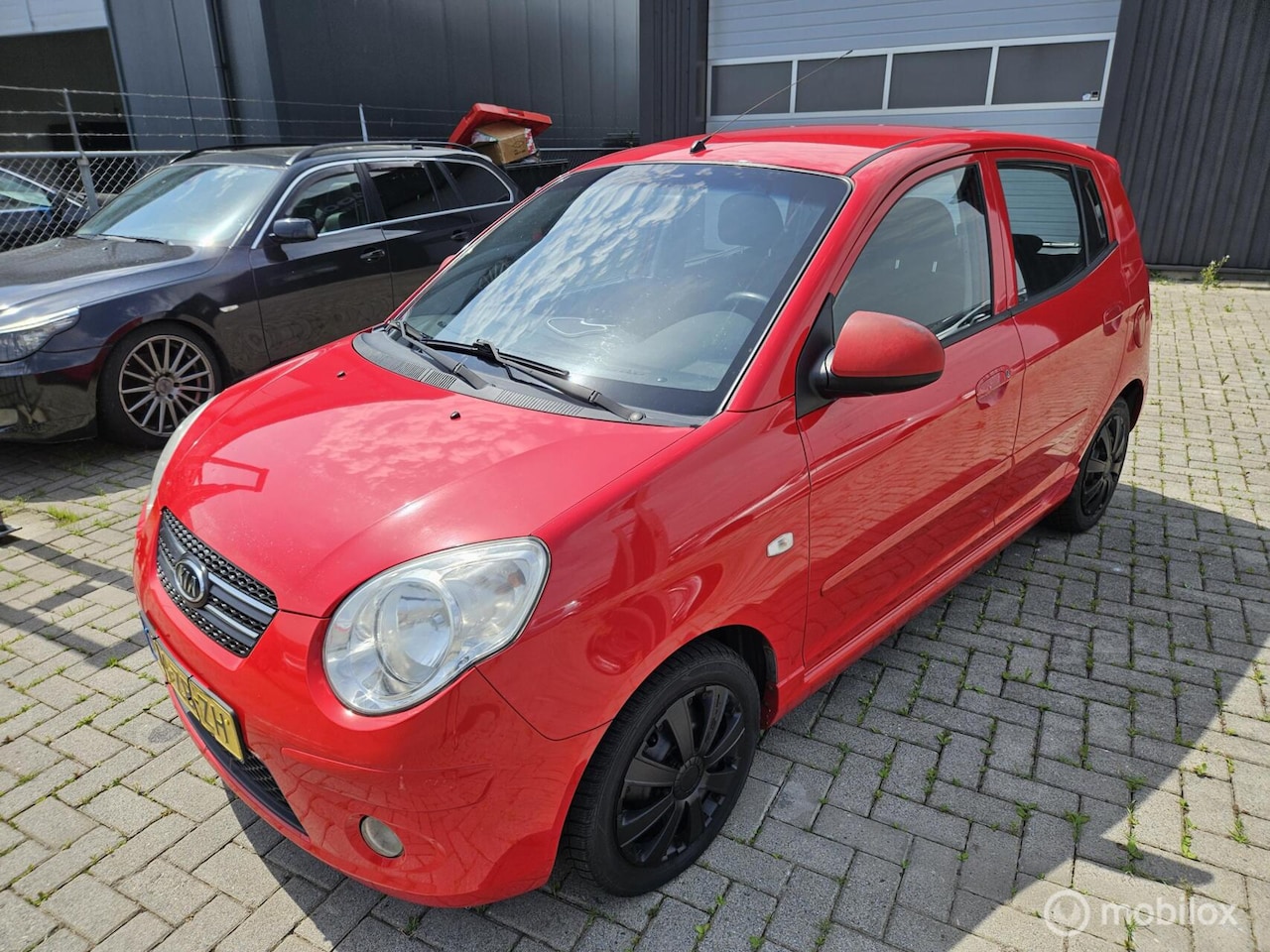 Kia Picanto - 1.1 X-tra First Edition APK AIRCO/TREKHAAK 06/2027 - AutoWereld.nl