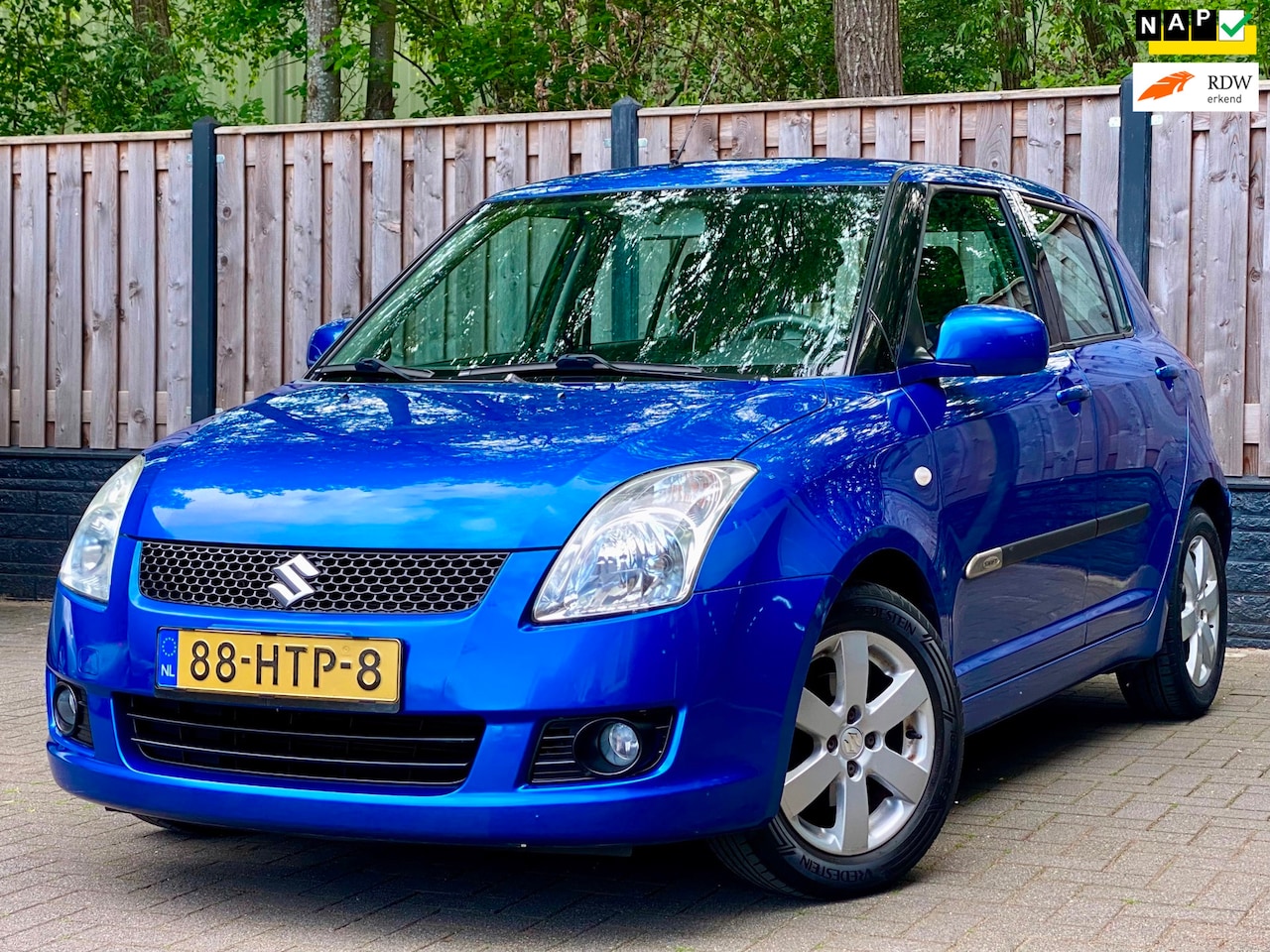 Suzuki Swift - 1.5 Exclusive NL Auto I AIRCO I APK I LMV I KEYLESS - AutoWereld.nl