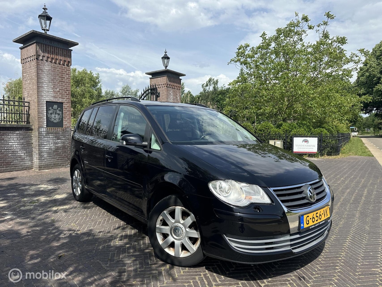 Volkswagen Touran - 1.6 2009 7-personen Airco Navi Cruise✅ - AutoWereld.nl