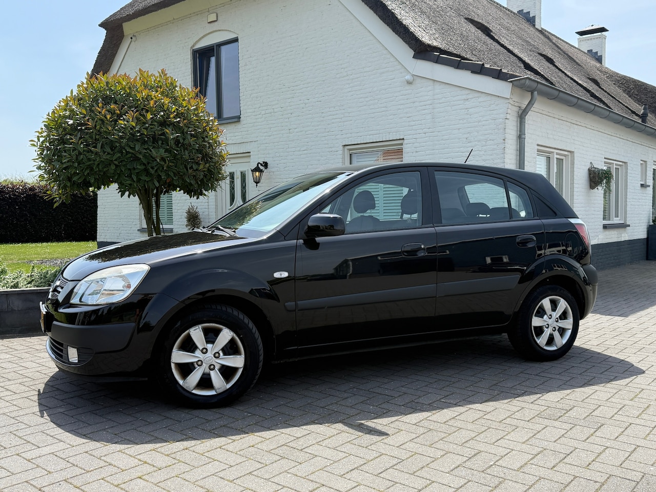 Kia Rio - 1.4 X / Bj: 2009 / Airco / - AutoWereld.nl