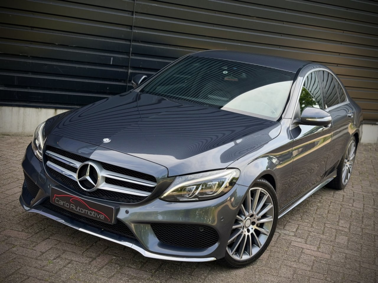Mercedes-Benz C-klasse - 200 AMG AUT|LEER|MEMORY|CAMERA|KEYLESS|LED NAP - AutoWereld.nl