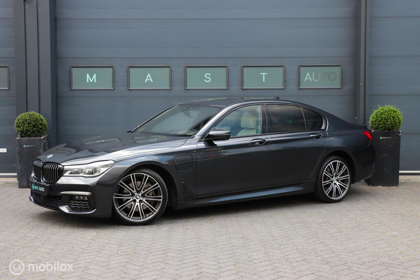 BMW 7-serie - 740e iPerformance High Executive|HUD|H&K|Massage|ACC|Soft close - AutoWereld.nl