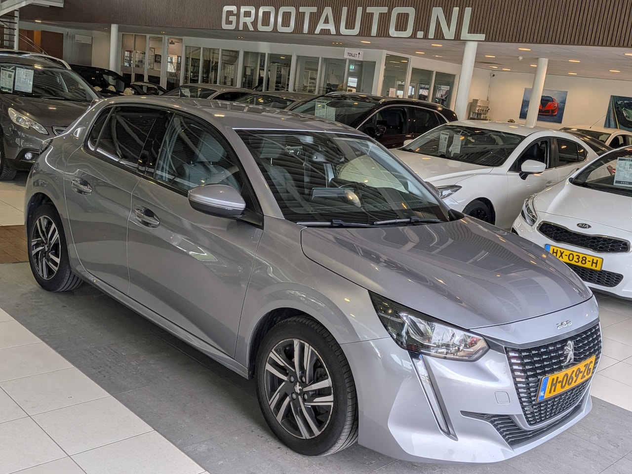 Peugeot 208 - 1.2 PureTech Blue Lease Allure Airco, Cruise Control, Stuurbekrachtiging - AutoWereld.nl